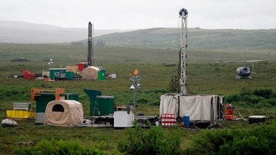 Workers with the Pebble Mine project test drill in the Bristol Bay region near the village of Iliamma, Alaska, July 13, 2007.