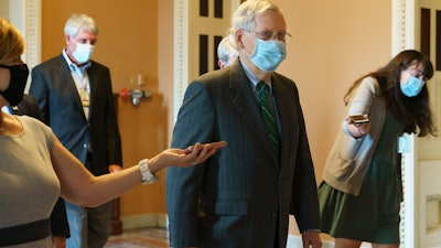 Senate Majority Leader Mitch McConnell, R-Ky., walks to his office on Capitol Hill, Sept. 8, 2020.