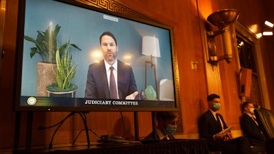 Donald Harrison, president of global partnerships and corporate development for Google, testifies via video conference on Capitol Hill, Sept. 15, 2020.