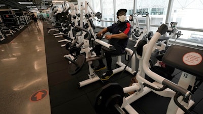 Wesley Thomas works out at Fitness SF Transbay during the coronavirus outbreak in San Francisco, Sept. 15, 2020.