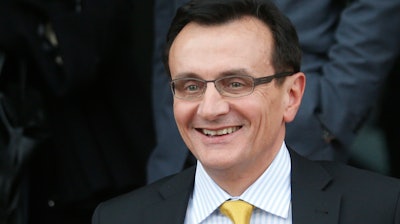AstraZeneca CEO Pascal Soriot leaves the British Parliament's Business Innovation and Skills Committee after a hearing in London.