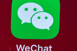 WeChat icon on a smartphone screen in Beijing, Aug. 7, 2020.