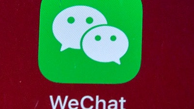 WeChat icon on a smartphone screen in Beijing, Aug. 7, 2020.