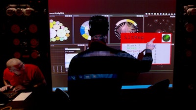 A mock cyberattack scenario in London, March 14, 2014.