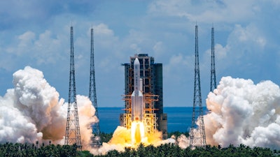 A Long March-5 rocket carrying the Tianwen-1 Mars probe lifts off from the Wenchang Space Launch Center, Hainan Province, July 23, 2020.