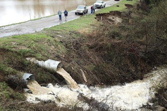 Officials monitor a potential dam/levee failure in the Springridge Place subdivision in Yazoo County, Miss., Feb. 11, 2020.