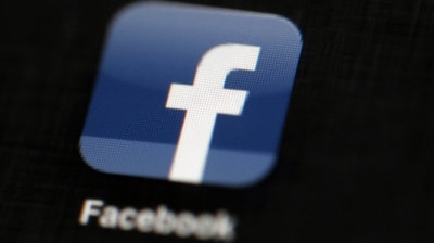 Facebook logo on an iPad, Philadelphia, May 16, 2012.
