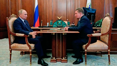 Russian President Vladimir Putin with Gazprom head Alexei Miller in Moscow, Sept. 16, 2020.