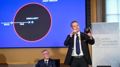 Ulf Danielsson of the Royal Swedish Academy of Sciences during a news conference, Stockholm, Oct. 6, 2020.