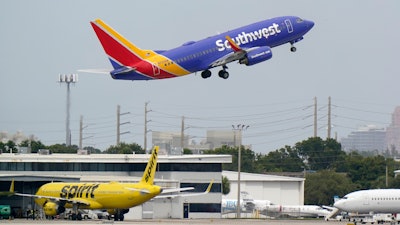 A Southwest Airlines Boeing 737-7H4 takes off from Fort Lauderdale-Hollywood International Airport in Fort Lauderdale, Fla., Oct. 20, 2020.