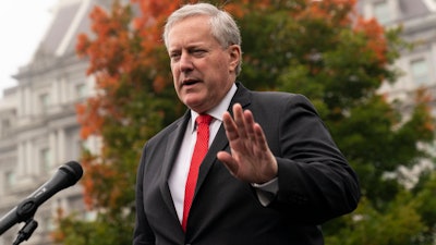 White House chief of staff Mark Meadows speaks with reporters at the White House, Oct. 21, 2020.