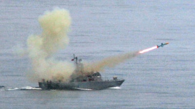 A Taiwanese navy frigate launches a Harpoon surface-to-surface missile during the annual Hankuang military exercises off Ilan, Taiwan, May 16, 2007.