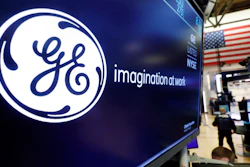 General Electric logo appears above a trading post on the floor of the New York Stock Exchange, Aug. 16, 2019.