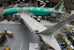In this March 27, 2019, photo taken with a fish-eye lens, a Boeing 737 MAX 8 airplane sits on the assembly line during a brief media tour in Boeing's 737 assembly facility in Renton, Wash.