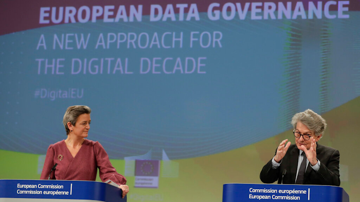 EU Executive Vice President Margrethe Vestager, left, and Commissioner for Internal Market Thierry Breton during a media conference in Brussels, Nov. 25, 2020.