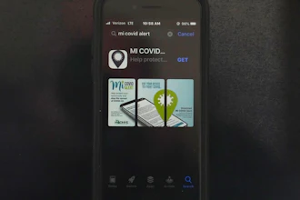 The MI COVID Alert app on an iPhone in Chicago, Oct. 15, 2020.