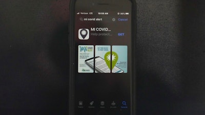 The MI COVID Alert app on an iPhone in Chicago, Oct. 15, 2020.