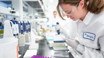 A Biogen scientist works on Alzheimer’s disease research in a laboratory at the drugmaker’s headquarters in Cambridge, Mass., Dec. 12, 2019.