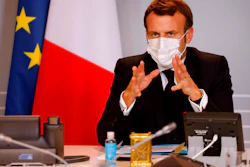 French President Emmanuel Macron chairs a video conference with foreign executives at the Elysee Presidential Palace in Paris, Nov. 6, 2020.