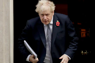 British Prime Minister Boris Johnson leaves 10 Downing Street in London, Nov. 10, 2020.