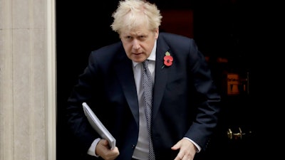 British Prime Minister Boris Johnson leaves 10 Downing Street in London, Nov. 10, 2020.