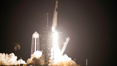 SpaceX Falcon9 rocket, with the Crew Dragon capsule attached, lifts off from Kennedy Space Center, Cape Canaveral, Fla., Nov. 15, 2020.