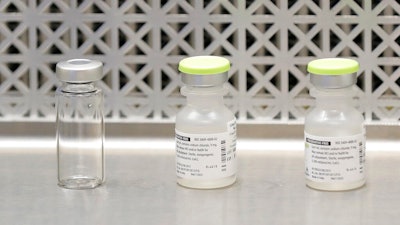 Vials used to prepare syringes in a first-stage safety study of the potential vaccine for COVID-19 at the Kaiser Permanente Washington Health Research Institute in Seattle, March 16, 2020.