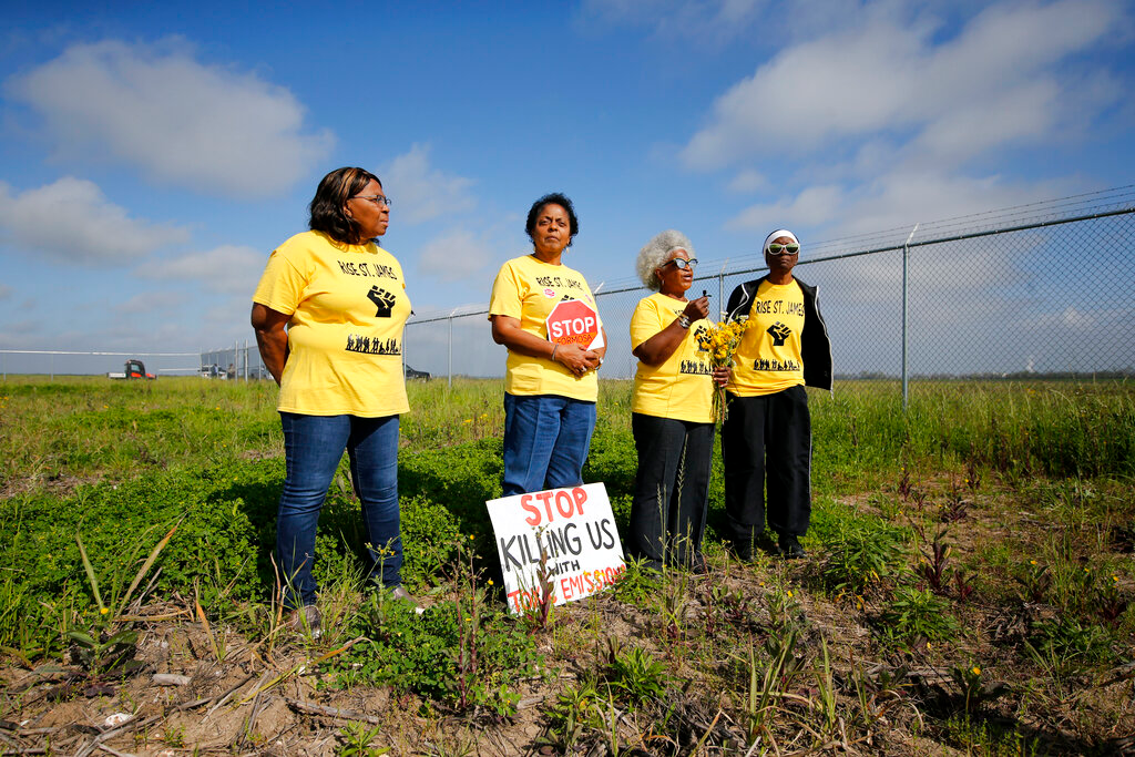 Myrtle Felton, from left, Sharon Lavigne, Gail LeBoeuf and Rita Cooper, members of RISE St. James, conduct a live stream video on property owned by Formosa in St. James Parish, La.