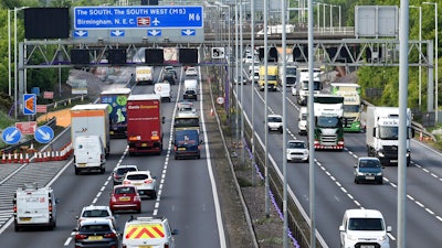 Traffic moves along the M6 motorway near Birmingham, England, May 18, 2020.