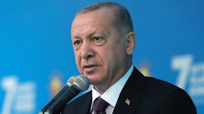 Turkish President Recep Tayyip Erdogan addresses his ruling Justice and Development Party members at a soccer stadium, Samsun, Turkey, Nov. 1, 2020.