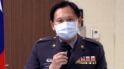 Taiwan's defense ministry spokesperson Shih Shun-wen speaks during a briefing in Taipei, Oct. 27, 2020.