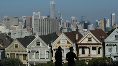 The 'Painted Ladies' historical Victorian homes seen from Alamo Square Park, San Francisco, Feb. 26, 2020.