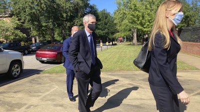 Former SCANA Corp. Senior Vice President Stephen Byrne enters the Matthew J. Perry, Jr. Courthouse in Columbia, S.C., July 23, 2020.