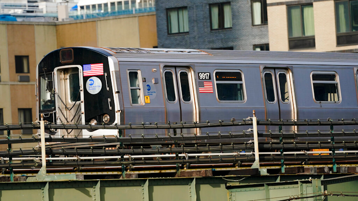 An N train moves through Queens, New York, Dec. 23, 2020.