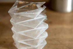 The researchers have developed an origami-inspired, folded plastic fuel bladder that doesn't crack at super cold temperatures and could someday be used to store and pump fuel.