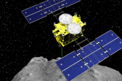 This computer graphics image shows the Hayabusa2 spacecraft above the asteroid Ryugu.