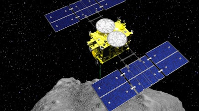 This computer graphics image shows the Hayabusa2 spacecraft above the asteroid Ryugu.