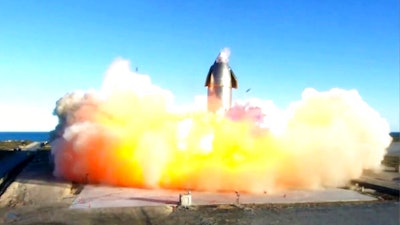 In this image taken from video, the company's Starship becomes engulfed in flames and ruptures upon touching down after a test flight in southern Texas, Dec. 9, 2020.