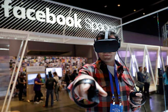 An attendee at Facebook's developer conference tries on Oculus Go goggles, San Jose, Calif., May 1, 2018.
