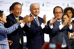 World leaders applaud after the final conference at the COP21, the U.N. conference on climate change.