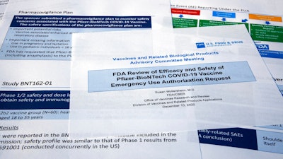 Documents created by the Food and Drug Administration for the meeting with the FDA advisory panel as Pfizer seeks approval for emergency use of their COVID-19 vaccine, Dec. 10, 2020.