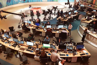 Al-Jazeera staff at their TV station in Doha, Qatar, June 8, 2017.