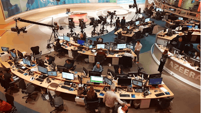 Al-Jazeera staff at their TV station in Doha, Qatar, June 8, 2017.