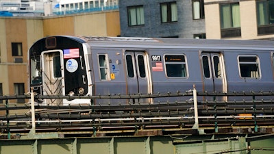 An N train moves through Queens, New York, Dec. 23, 2020.