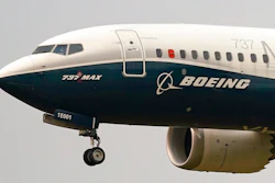 In this Sept. 30, 202, file photo, a Boeing 737 Max jet, piloted by Federal Aviation Administration (FAA) chief Steve Dickson, prepares to land at Boeing Field following a test flight in Seattle. Boeing Co. reported more cancellations for its 737 Max jet, which this week is scheduled to carry paying passengers for the first time since the planes were grounded 21 months ago after two deadly crashes. The company said Tuesday, Dec. 8, 2020, that orders for 88 of the planes were canceled in November.