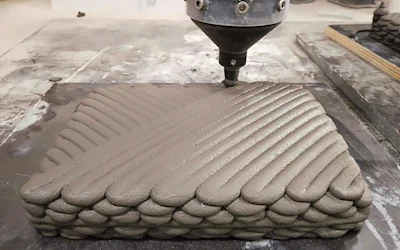 Concrete 3D printed in patterns inspired by the internal structure of lobster shells.