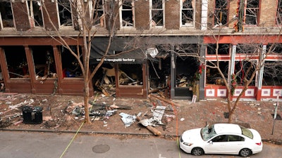 Debris in front of buildings damaged in a Christmas Day explosion in Nashville, Tenn., Dec. 29, 2020.