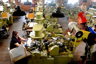 Zeida Hernandez, left, makes cigars at the J.C. Newman Cigar Co., Tampa, Fla., Dec. 14, 2020