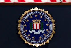 The FBI seal seen before a news conference at FBI headquarters in Washington, June 14, 2018.
