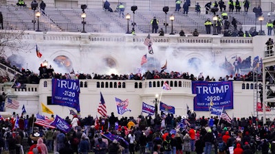 Violent protesters loyal to President Donald Trump storm the Capitol, Jan. 6, 2021, Washington.